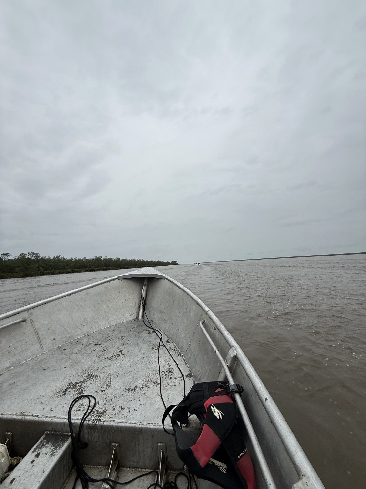 On the river · skiff bow heading out